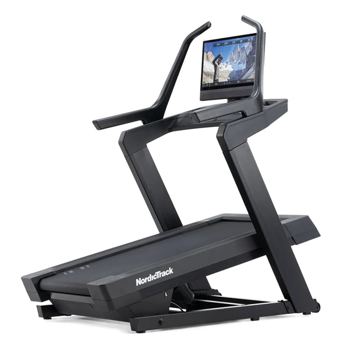 A person running on the NordicTrack X24 Treadmill, showing its large 24-inch touchscreen display A person running on the NordicTrack X24 Treadmill, showing its large 24-inch touchscreen display