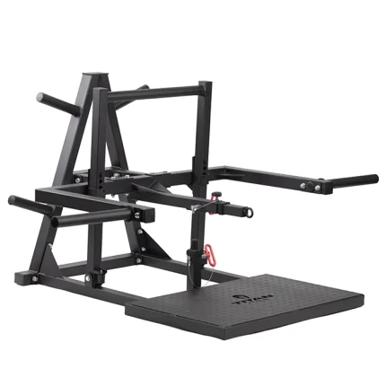 A person performing a Lower Body Belt Squat Machine, with the weight loaded and the nylon belt positioned around their hips