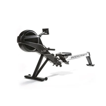 A person performing a full-body rowing workout on the Rower VR400 Pro BodyCraft