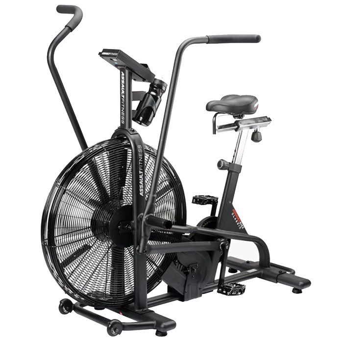 A person performing a high-intensity full-body workout on the Bike Assault AirBike, showing both arm and leg movement A person performing a high-intensity full-body workout on the Bike Assault AirBike, showing both arm and leg movement
