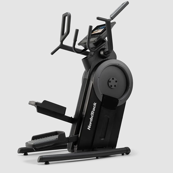 A person performing a low-impact stair-stepping workout on the NEW Step Climber NordicTrack, showing its 10-inch touchscreen A person performing a low-impact stair-stepping workout on the NEW Step Climber NordicTrack, showing its 10-inch touchscreen