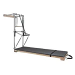 BASI Systems Pilates Wall Tower with vertical frame and attached springs