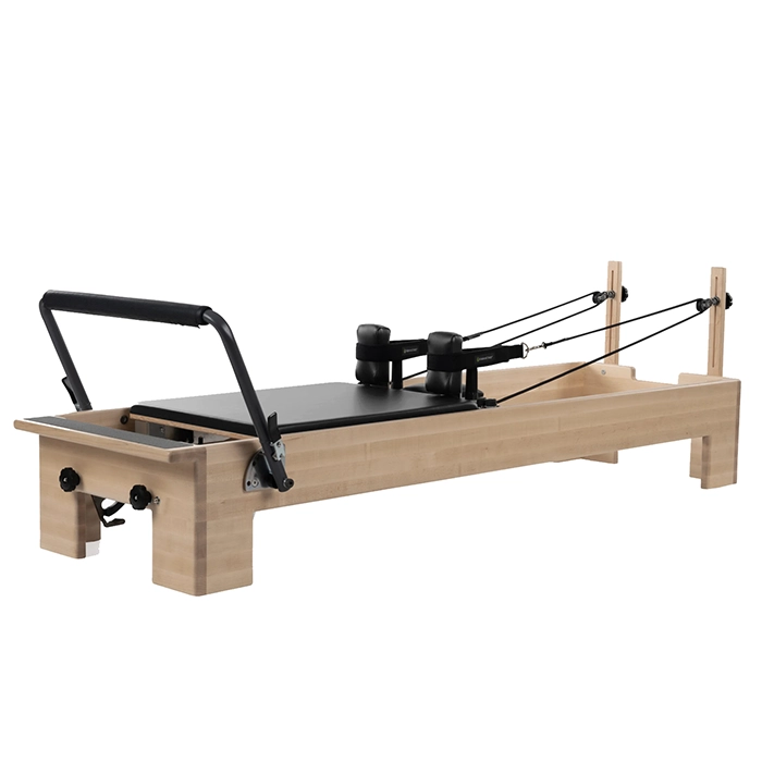 Balanced Body Studio Reformer with solid maple frame and black upholstery Balanced Body Studio Reformer with solid maple frame and black upholstery