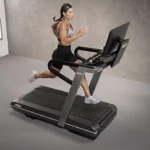 Close-up of the Technogym Run HIIT Treadmill Slat Belt technology for low-impact running