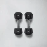 Close-up of the knurled steel handle on the Centr x HYROX Commercial Dumbbells