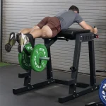Lower Body Machines H-PND A person performing a reverse hyperextension exercise, highlighting the targeted muscle groups and machine's design