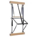 Micro-adjusting spring holders on the BASI Systems Wall Unit Pilates aluminum tracks