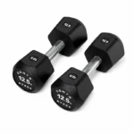 Pair of Centr x HYROX 12.5kg commercial urethane dumbbells on a gym floor Centr x HYROX Commercial Dumbbell