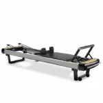 Peak Pilates MVe Reformer Bundle with stackable aluminum frame and black upholstery
